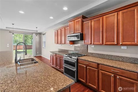 Kitchen - 317 Phoenix Ave SW, Orting, WA 98360 photo 1 of 4