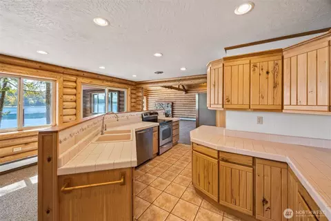 Kitchen - 1236 E Island View Rd, Grapeview, WA 98546 photo 2 of 2