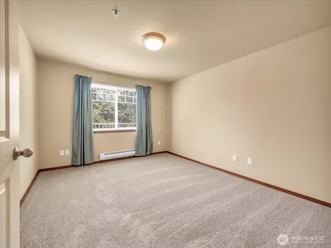 Bedroom - 11527 Highway 99 #E305, Everett, WA 98204 photo 2 of 3