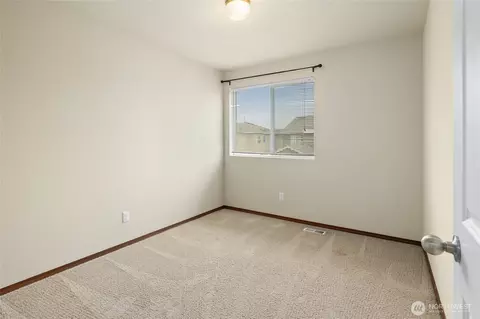 Bedroom - 1749 181st St E, Spanaway, WA 98387 photo 2 of 8