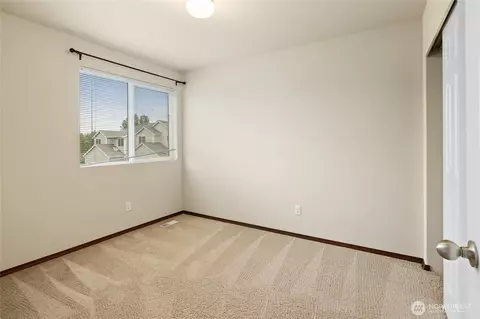 Bedroom - 1749 181st St E, Spanaway, WA 98387 photo 4 of 8