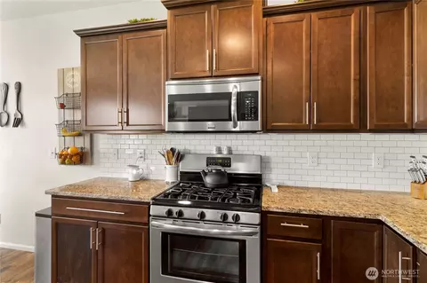 Kitchen - 902 Van Ogle Ln NW, Orting, WA 98360 photo 4 of 5