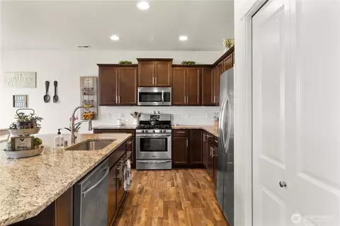 Kitchen - 902 Van Ogle Ln NW, Orting, WA 98360 photo 3 of 5