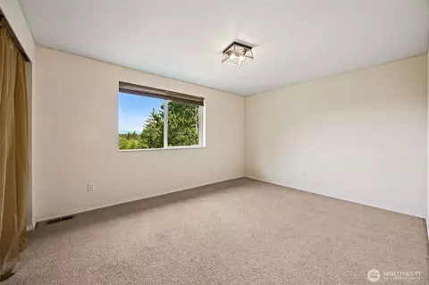 Bedroom - 210 E Mossflower Ln, Grapeview, WA 98546 photo 2 of 4