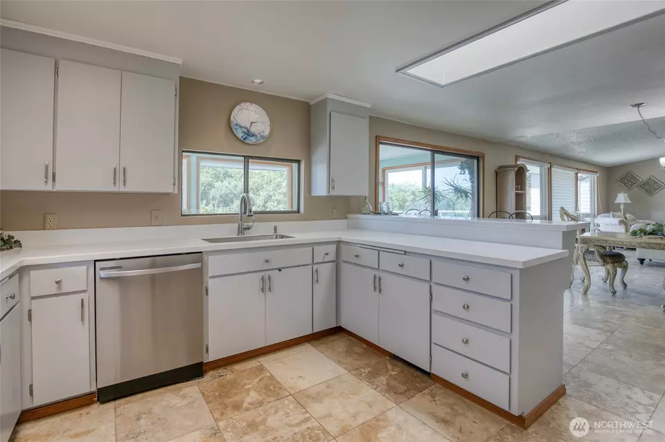 Kitchen - 101 Sand Dune Ave NW, Ocean Shores, WA 98569 photo 2 of 5
