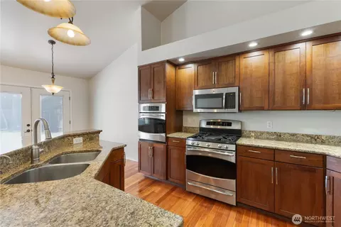 Kitchen - 415 Eldredge Ave NW, Orting, WA 98360 photo 3 of 4