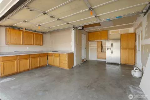 Kitchen - 415 Eldredge Ave NW, Orting, WA 98360 photo 4 of 4