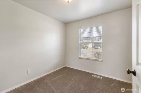 Bedroom - 415 Eldredge Ave NW, Orting, WA 98360 photo 2 of 5