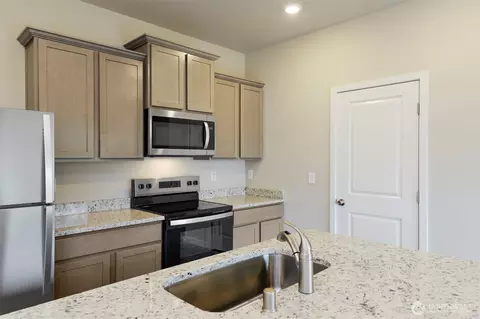 Kitchen - 8508 13th Ave E, Tacoma, WA 98445 photo 3 of 3