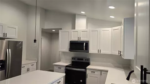 Kitchen - 400 E Mclane Cove Dr, Grapeview, WA 98546 photo 2 of 2