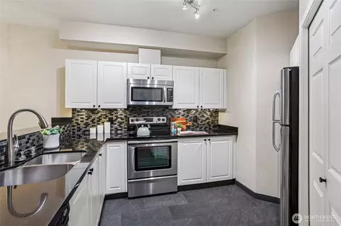 Kitchen - 12118 NE 171st Pl #E202, Bothell, WA 98011 photo 1 of 3
