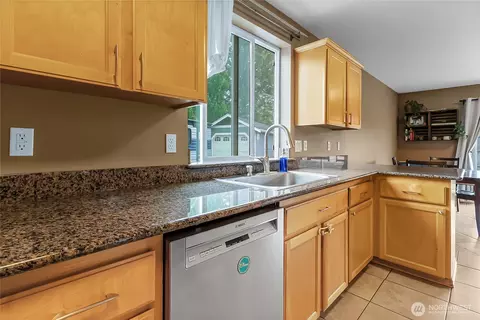 Kitchen - 1309 Riddell Ave NE, Orting, WA 98360 photo 3 of 4