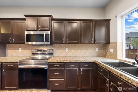 Kitchen - 18509 11th Ln E, Spanaway, WA 98387 photo 3 of 5