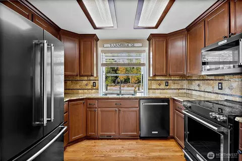 Kitchen - 6704 224th St E, Spanaway, WA 98387 photo 2 of 2