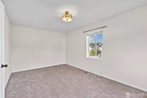 Bedroom - 1105 Sigafoos Ave NW, Orting, WA 98360 photo 2 of 8
