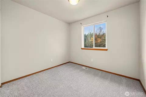 Bedroom - 1503 Riddell Ave NE, Orting, WA 98360 photo 5 of 6