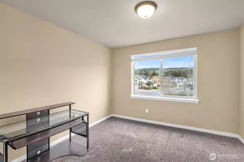 Bedroom - 1615 Riddell Ave NE, Orting, WA 98360 photo 3 of 5