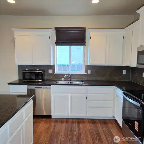 Kitchen - 1605 Riddell Ave NE, Orting, WA 98360 photo 2 of 3