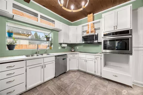 Kitchen - 111 Cedar Ave #1, Sultan, WA 98294 photo 2 of 3
