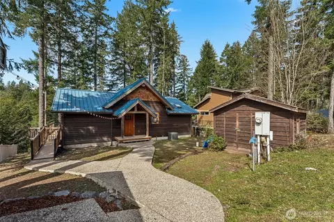 Exterior - 390 Emerald Lake Dr E, Grapeview, WA 98546 photo 1 of 7
