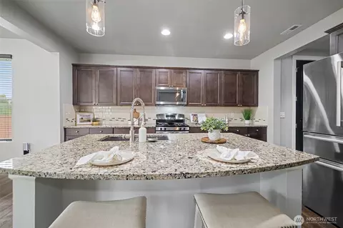 Kitchen - 207 Fielding St NE, Orting, WA 98360 photo 4 of 4