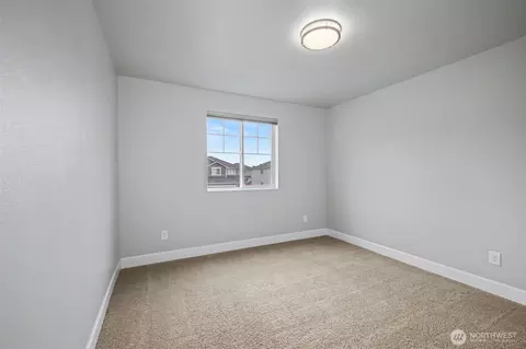 Bedroom - 207 Fielding St NE, Orting, WA 98360 photo 4 of 5