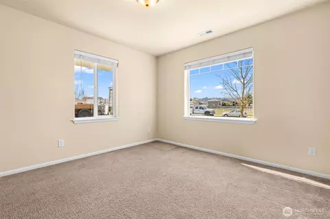 Bedroom - 1408 Daffodil Ave NE, Orting, WA 98360 photo 5 of 5