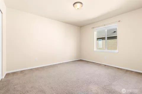 Bedroom - 1408 Daffodil Ave NE, Orting, WA 98360 photo 3 of 5