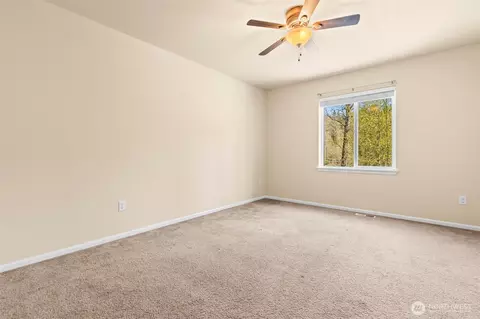 Bedroom - 1408 Daffodil Ave NE, Orting, WA 98360 photo 4 of 5