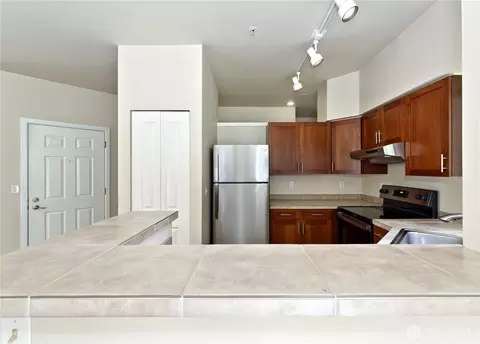 Kitchen - 12012 NE 204th Pl #C201, Bothell, WA 98011 photo 2 of 2