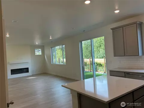 Living - 719 Teetor Cir NW #LOT 20, Orting, WA 98360 photo 2 of 3