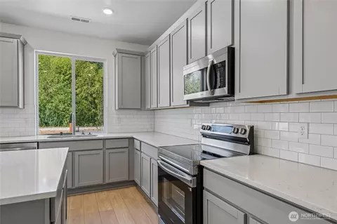 Kitchen - 719 Teetor Cir NW #LOT 20, Orting, WA 98360 photo 2 of 2