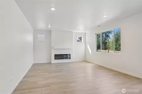 Living - 719 Teetor Cir NW #LOT 20, Orting, WA 98360 photo 1 of 3