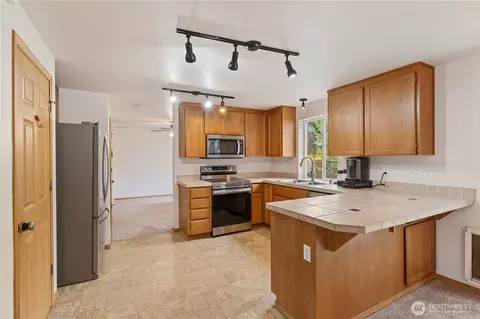 Kitchen - 4916 204th Street Ct E, Spanaway, WA 98387 photo 3 of 4