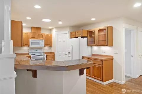 Kitchen - 160 E Soderberg Rd #C7, Allyn, WA 98524 photo 1 of 5