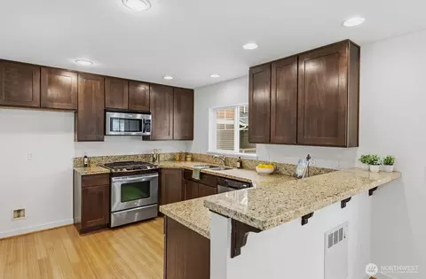 Kitchen - 931 N A N 97th St, Seattle, WA 98103 photo 3 of 3