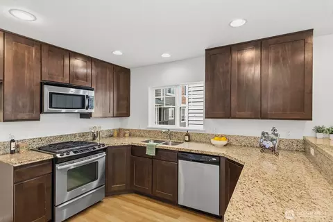Kitchen - 931 N A N 97th St, Seattle, WA 98103 photo 1 of 3