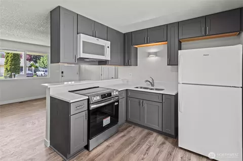 Kitchen - 17407 E 11th Ave, Spanaway, WA 98387 photo 2 of 2