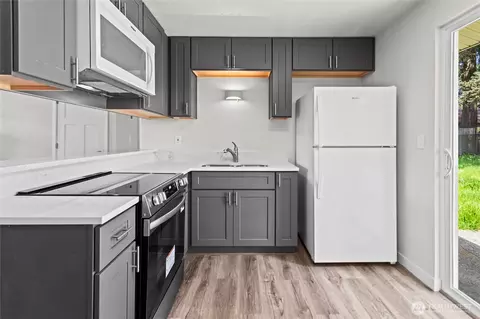 Kitchen - 17407 E 11th Ave, Spanaway, WA 98387 photo 1 of 2