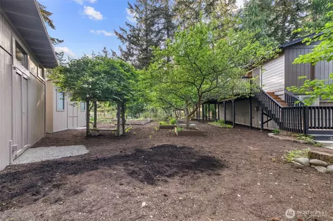 Exterior - 136 Rainier Acres Rd SE, Rainier, WA 98576 photo 9 of 11