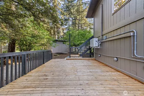 Exterior - 136 Rainier Acres Rd SE, Rainier, WA 98576 photo 5 of 11