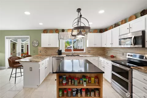 Kitchen - 1203 Blue Jay Ave SW, Orting, WA 98360 photo 4 of 7