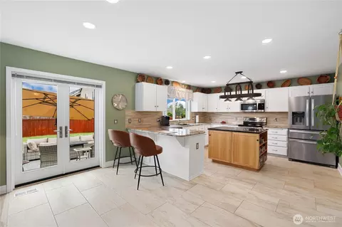 Kitchen - 1203 Blue Jay Ave SW, Orting, WA 98360 photo 2 of 7