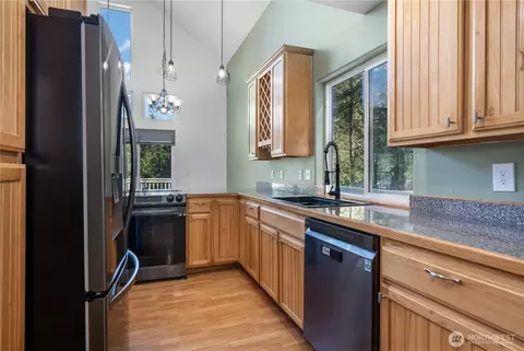 Kitchen - 110 E Glacier Crest Rd, Grapeview, WA 98546 photo 2 of 3