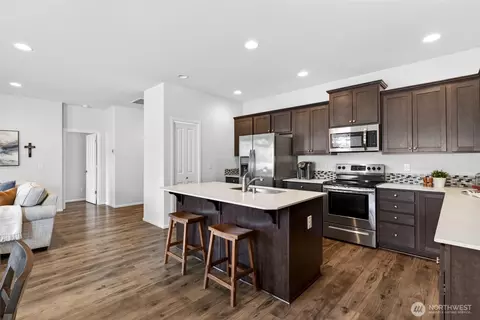 Kitchen - 104 Walnut Ave SW #23, Orting, WA 98360 photo 2 of 3