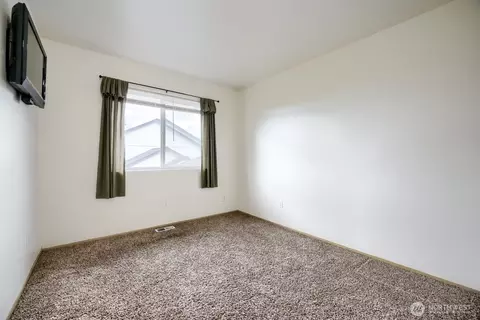 Bedroom - 21908 40th Ave E, Spanaway, WA 98387 photo 5 of 8