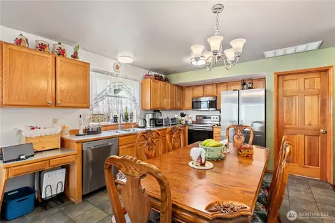 Kitchen - 409 Kensington Ave NW, Orting, WA 98360 photo 1 of 2