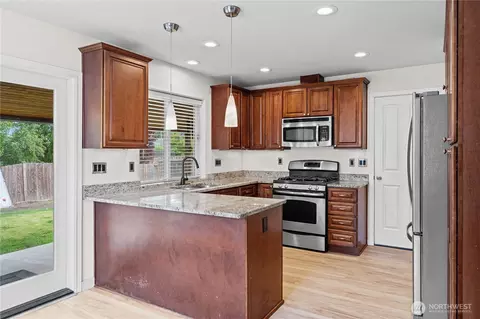 Kitchen - 411 Rudnick Ct NW, Orting, WA 98360 photo 1 of 3