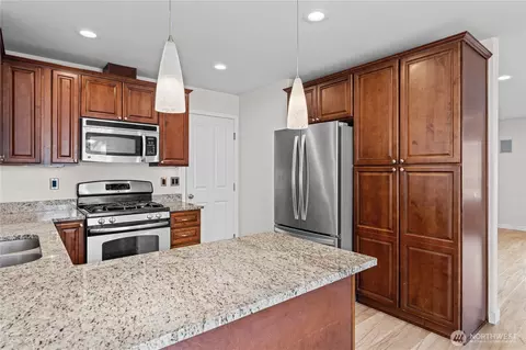 Kitchen - 411 Rudnick Ct NW, Orting, WA 98360 photo 2 of 3