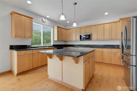 Kitchen - 1522 Daffodil Ave NE, Orting, WA 98360 photo 2 of 3